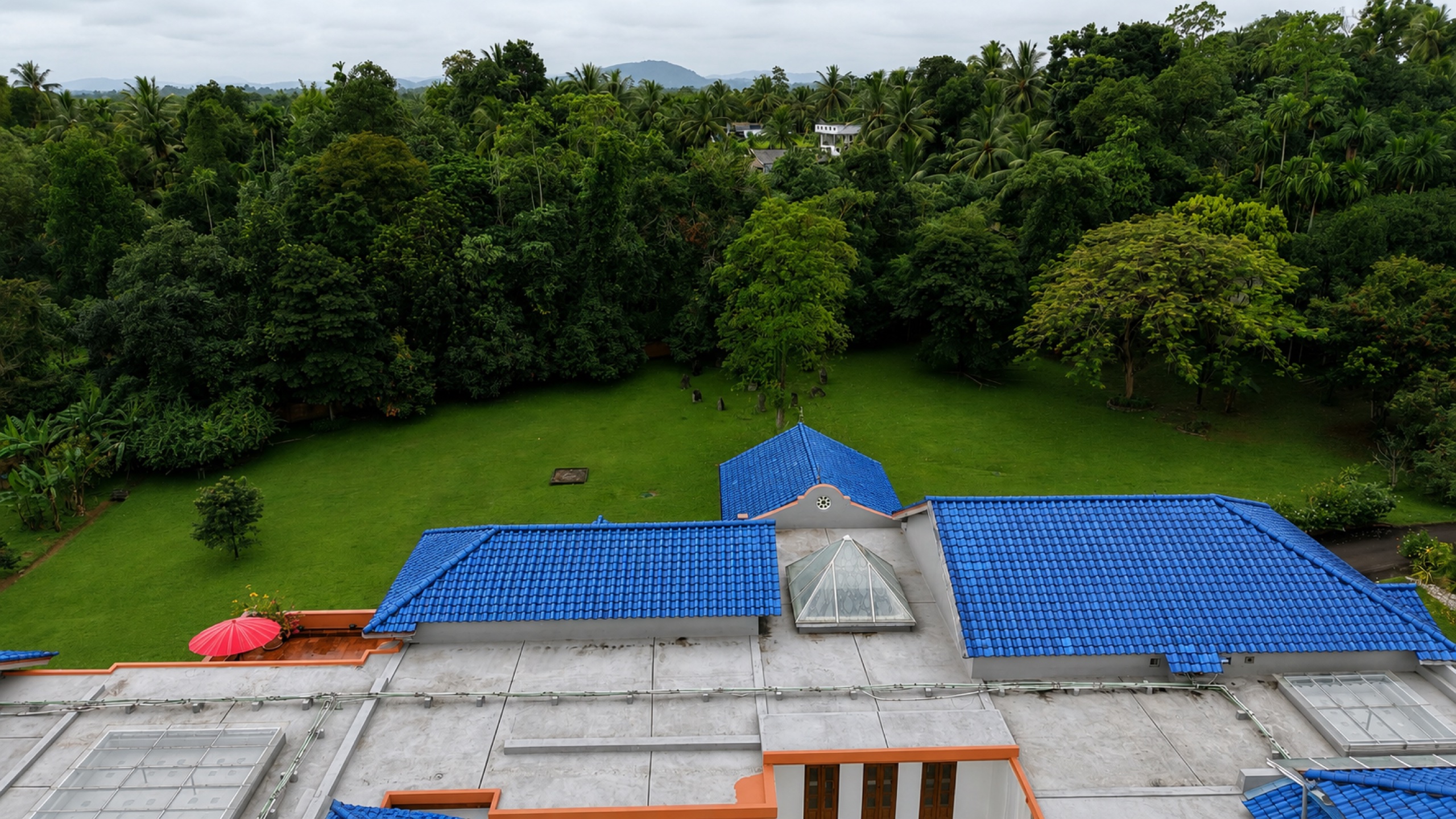 Overhead view of the Oasis Estate residence and surrounding grounds
